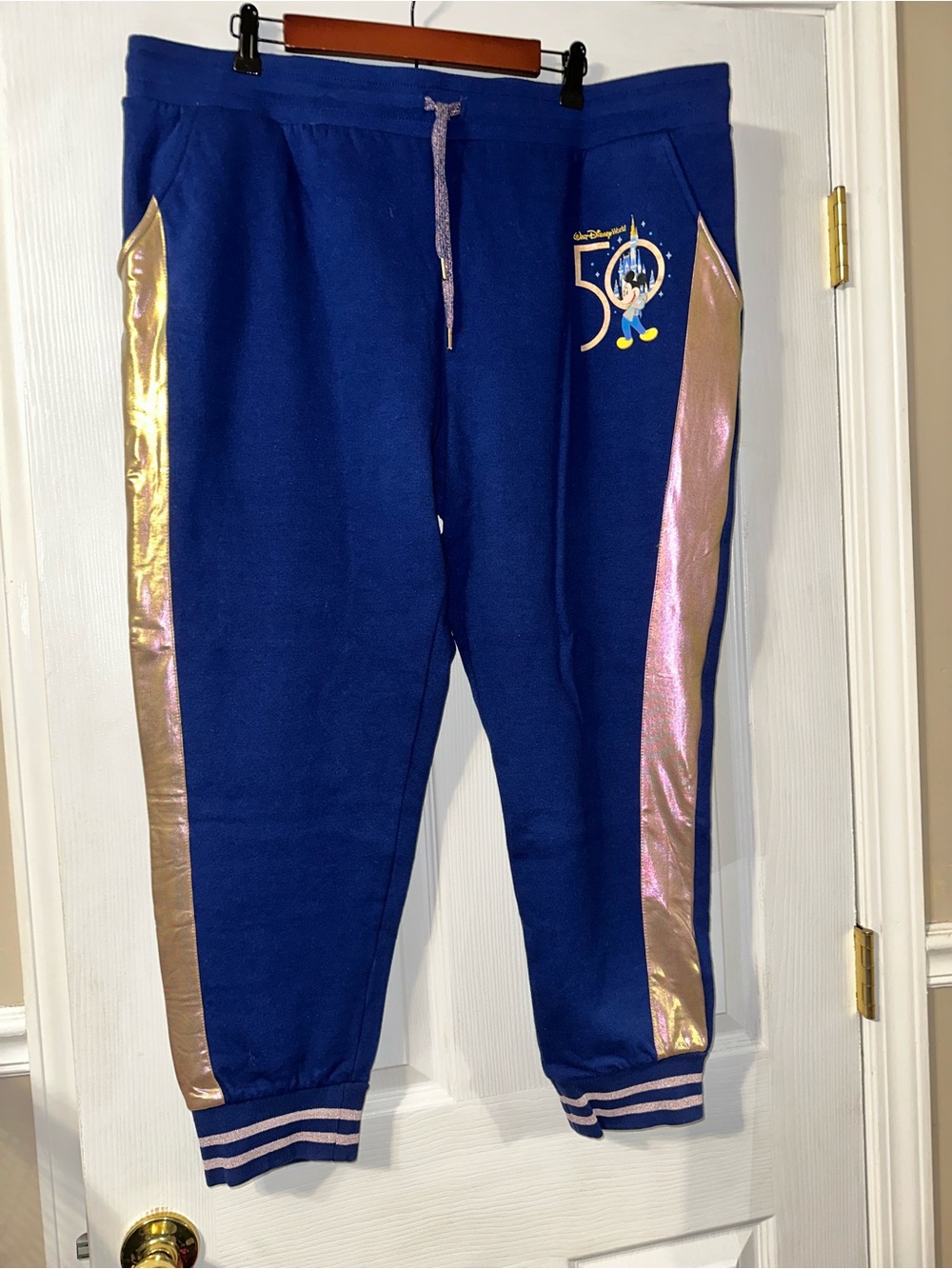 Disney 50th Anniversary Women’s' Blue Jogger Pants with Pink-Gold Trim